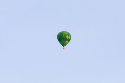 Low angle view of hot air balloon against clear sky