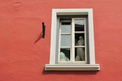 Close-up of window on brick wall