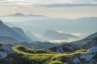 Scenic view of mountains against sky during sunset