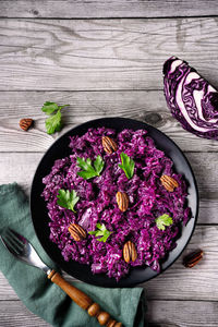 High angle view of chopped vegetables in bowl on table