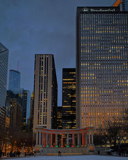 Modern buildings in city at dusk