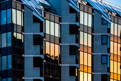 Full frame shot of modern building against blue sky