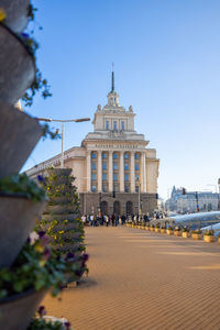 Sofia, bulgaria - 26 dec 2023- bulgaria's national assembly building in a bustling cityscape