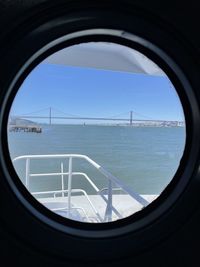 View of sea seen through window