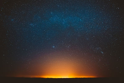 Low angle view of star field against sky at night