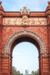 Architectural close-up on the center of the red brick arch of barcelona in spain