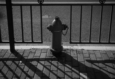 Shadow of people on footpath