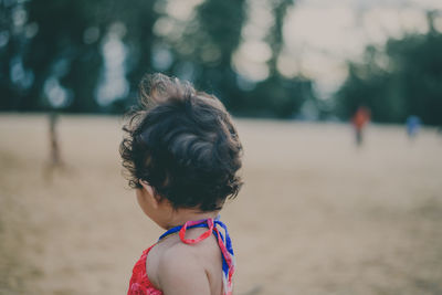 Close-up of baby girl at park