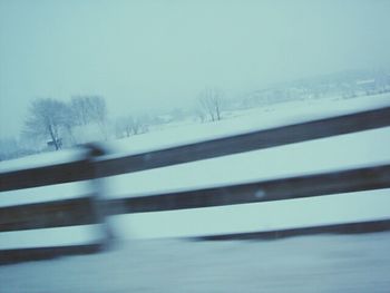 Blurred motion of train seen through window