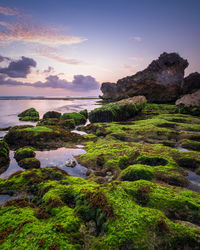 Dramatic sunset sky at ngrumput beach, yogyakarta, indonesia. hdr processed