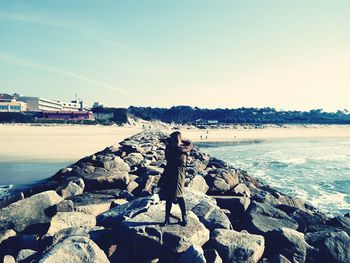 Scenic view of sea against clear sky during sunset