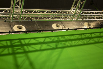 Low angle view of basketball hoop at night