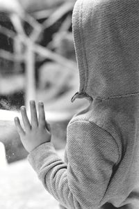 Close-up portrait of woman holding hands