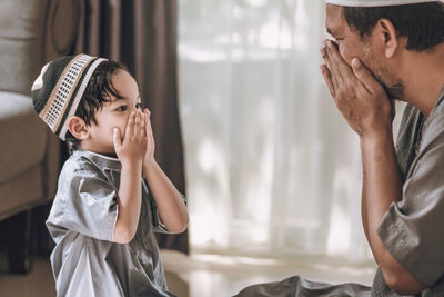 Portrait of boy wearing hat