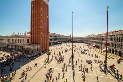 Crowd at san marco campanile against sky