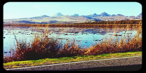 Scenic view of lake and mountains