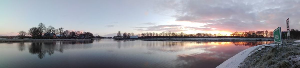 Panoramic view of city at sunset