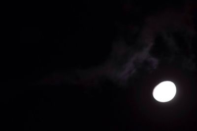 Low angle view of moon against the sky