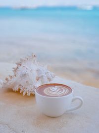 Close-up of wedding rings on table
