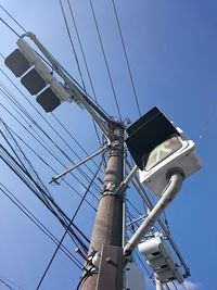 Low angle view of electricity pylon