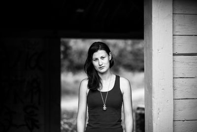 Portrait of woman standing outdoors