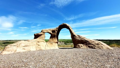 Built structure on land against sky