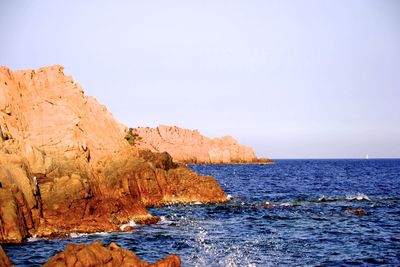 Scenic view of sea against clear sky