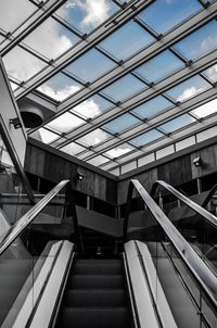 Low angle view of escalator in building