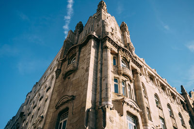 Low angle view of historic building against sky