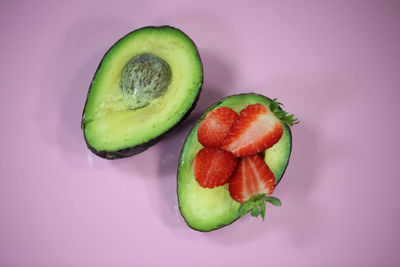 Close-up of fruits against white background