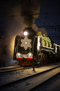 Cars on street at night