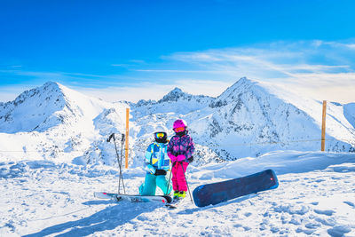 Mother and daughter on ski, winter holidays in andorra, el tarter, pyrenees