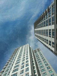 Low angle view of modern buildings against sky