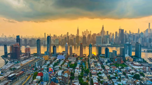 High angle view of cityscape against sky during sunset