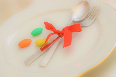 High angle view of multi colored art on table