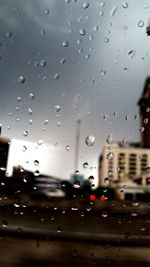 View of rain drops on glass window