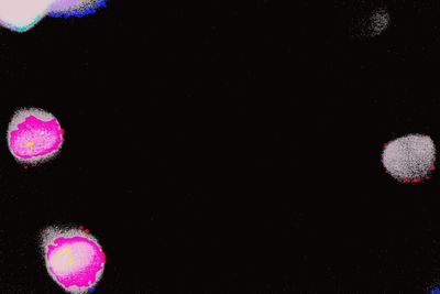 Low angle view of illuminated sky at night