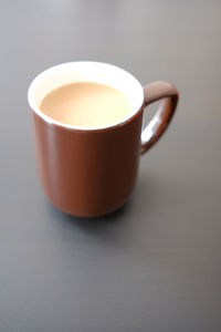 High angle view of coffee cup on table