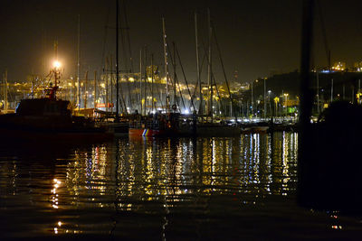 View of harbor at night