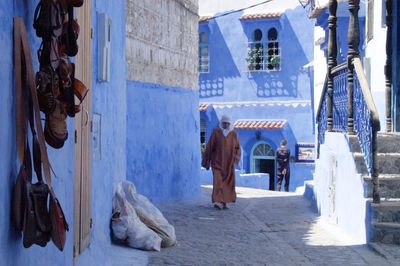 Panoramic view of street amidst buildings in city