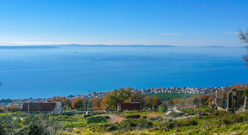 Scenic view of calm sea against blue sky