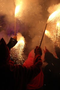Correfoc parties, typical with firecrackers and lights in the towns