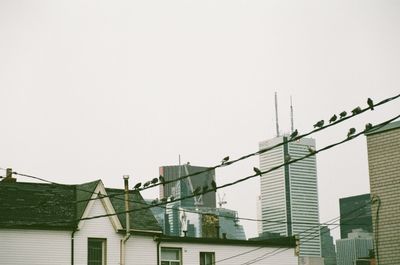 Low angle view of buildings against clear sky