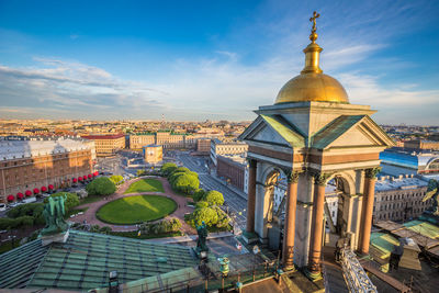 High angle view of buildings in city against sky