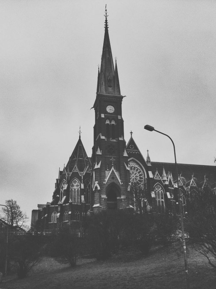 place of worship, religion, architecture, building exterior, church, built structure, spirituality, low angle view, sky, cathedral, cross, dome, outdoors, facade, no people, day, history, steeple