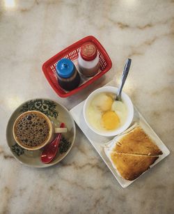 High angle view of breakfast served on table