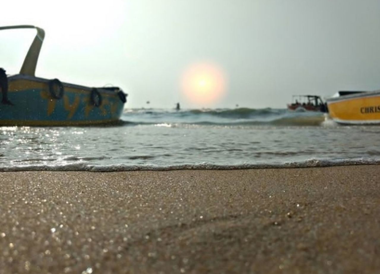 VIEW OF BEACH AT SUNSET