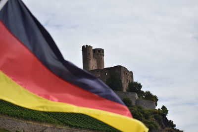Low angle view of flag against sky