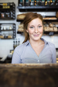 Young woman working in cafe, stockholm, sweden