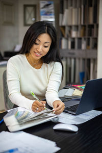 Businesswoman working at office